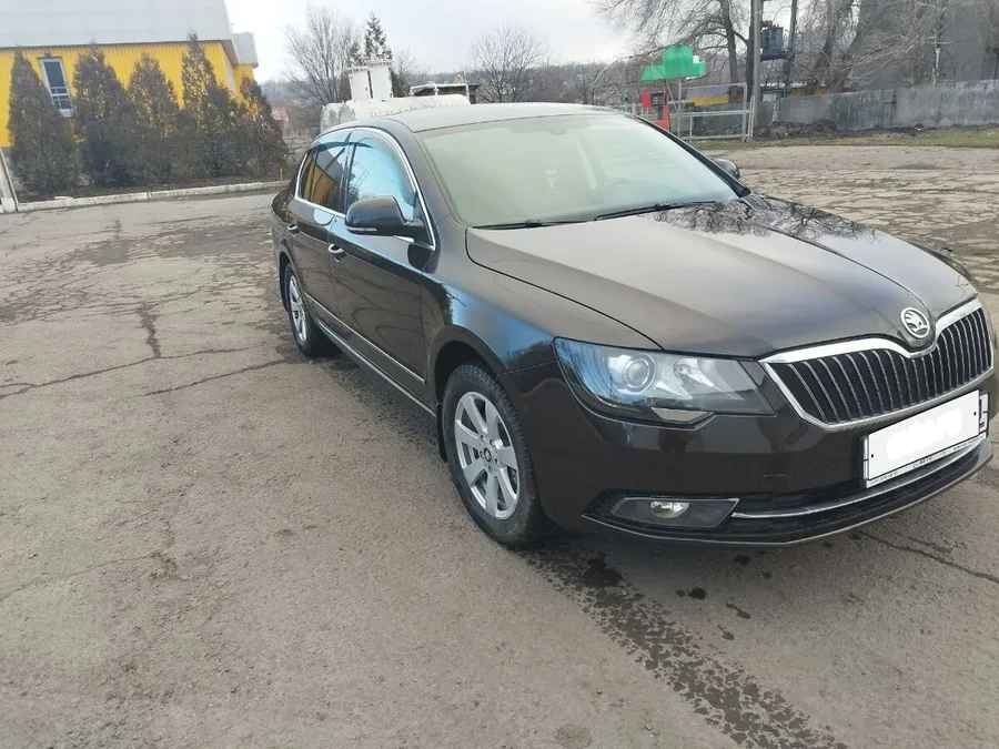 Skoda Superb II — фото поколения